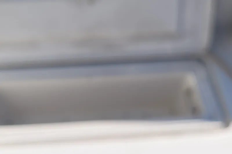 Wave Dancer Yacht Photos Pics Blurry image of an open compartment on a 2002 SeaTek 36 Express boat.