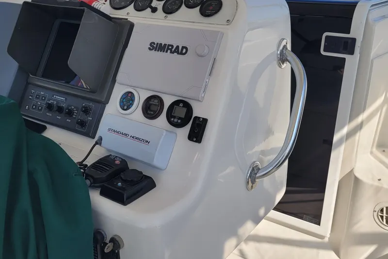 Wave Dancer Yacht Photos Pics Control panel of 2002 SeaTek 36 Express boat with navigation equipment.