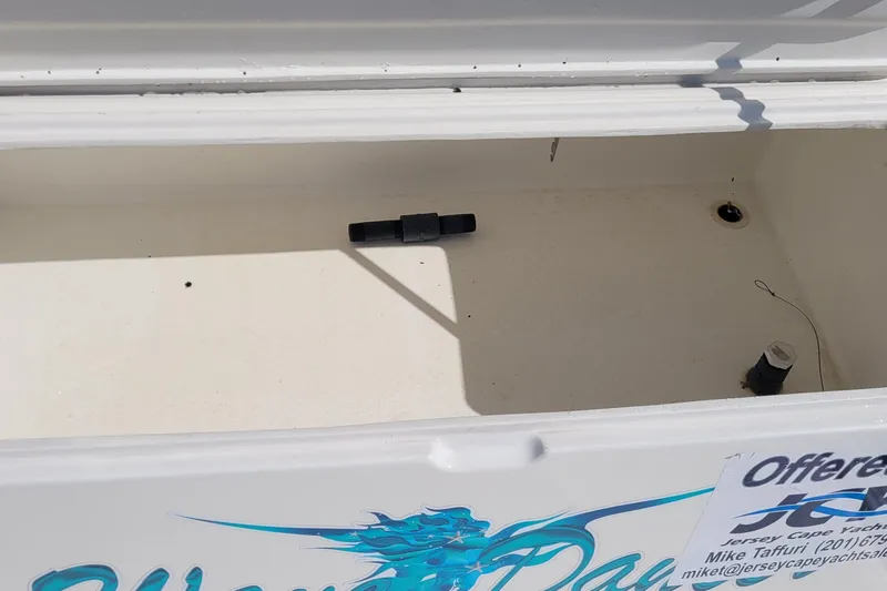 Wave Dancer Yacht Photos Pics Open storage compartment on 2002 SeaTek 36 Express boat, featuring clean interior space.