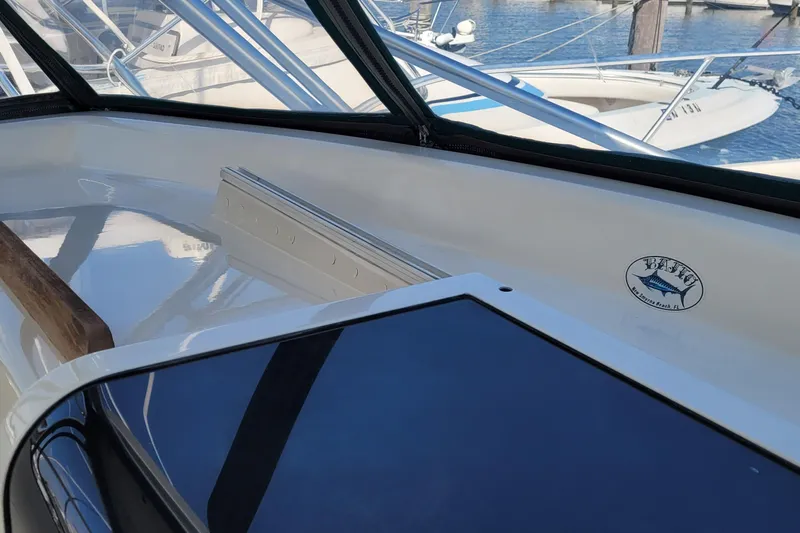 Wave Dancer Yacht Photos Pics 2002 SeaTek 36 Express boat interior with marina view in background.