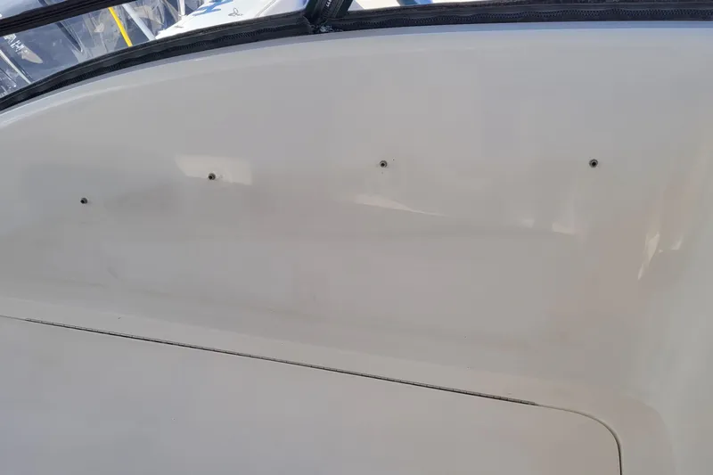 Wave Dancer Yacht Photos Pics Side view of a 2002 SeaTek 36 Express boat, showcasing its sleek white exterior.