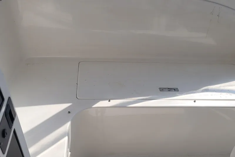 Wave Dancer Yacht Photos Pics Interior view of a 2002 SeaTek 36 Express boat, featuring a clean, white compartment.