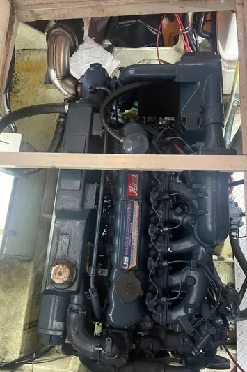  Yacht Photos Pics Engine of a 1988 Bayliner 4588 yacht, showcasing intricate mechanical components.