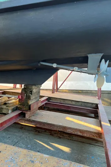  Yacht Photos Pics 1988 Bayliner 4588 yacht hull and propeller on dry dock for maintenance.