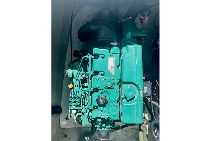 Still Knot A Clue Yacht Photos Pics Engine of 2015 Fountaine Pajot Helia Maestro catamaran, showcasing mechanical components.