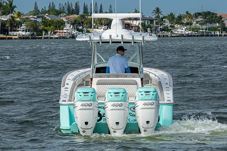 Eos Yacht Photos Pics 2020 Valhalla Boatworks V-37 with triple 400 engines cruising on a scenic waterway.