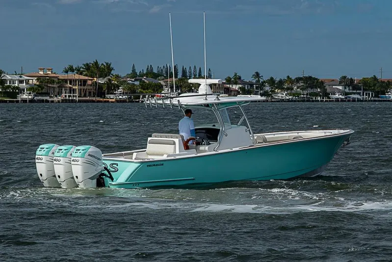 Eos Yacht Photos Pics 2020 Valhalla Boatworks V-37 cruising on water with triple Mercury engines.