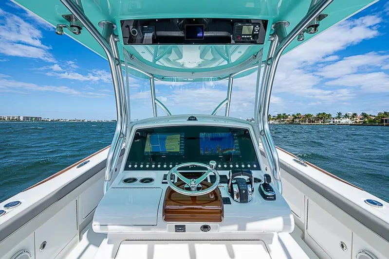 Eos Yacht Photos Pics 2020 Valhalla Boatworks V-37 helm with advanced navigation system on open water.