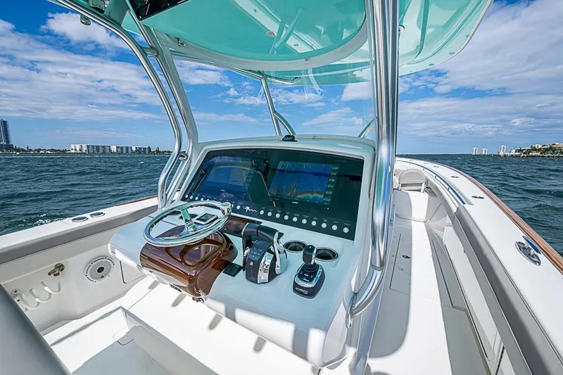 Eos Yacht Photos Pics 2020 Valhalla Boatworks V-37 helm with advanced navigation system on open water.
