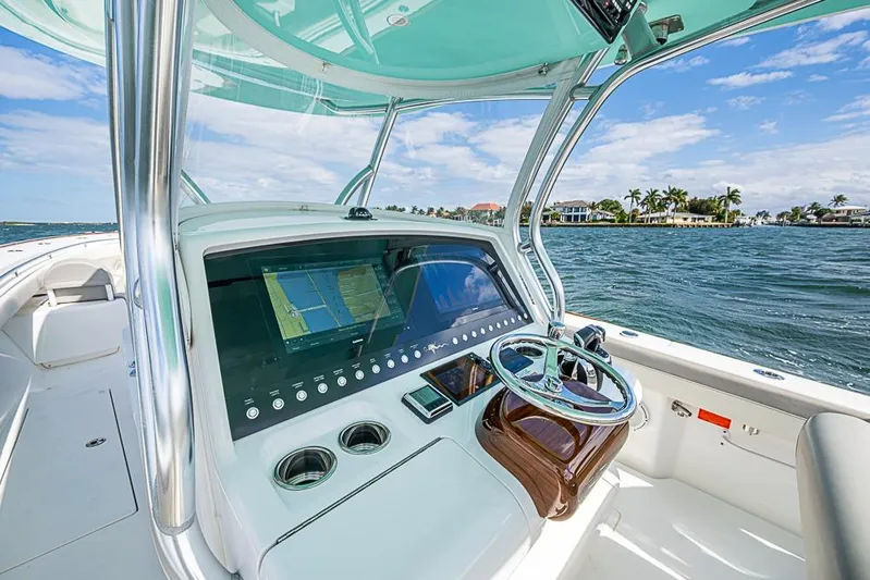 Eos Yacht Photos Pics 2020 Valhalla Boatworks V-37 helm with advanced navigation system on open water.
