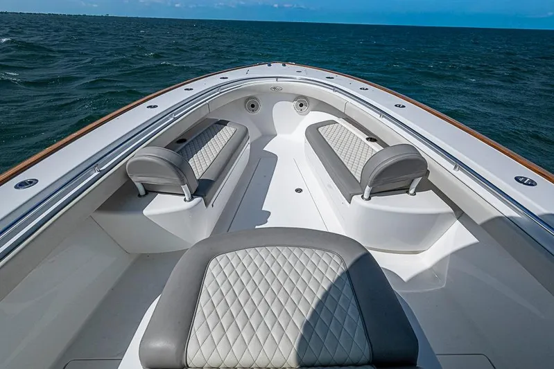 Eos Yacht Photos Pics 2020 Valhalla Boatworks V-37 interior with cushioned seating on open water.