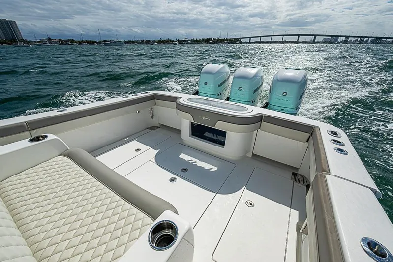 Eos Yacht Photos Pics 2020 Valhalla Boatworks V-37 with triple engines cruising on open water.