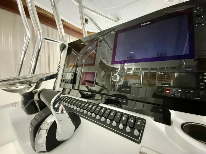  Yacht Photos Pics Control panel of 2023 Freeman 34VH boat with advanced navigation and communication systems.