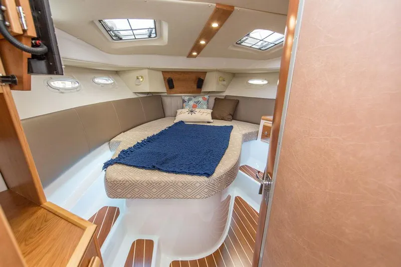  Yacht Photos Pics Manufacturer Provided Image: 2022 Cutwater C-32 CB cabin interior with bed and skylights.