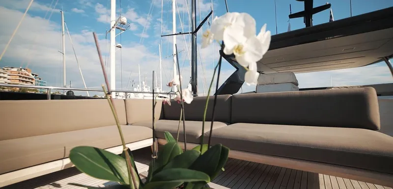  Yacht Photos Pics Sanlorenzo SL94 yacht deck with seating and flowers, 2013 model.