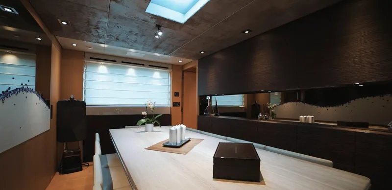  Yacht Photos Pics Luxurious interior of 2013 Sanlorenzo SL94 yacht with modern dining area and elegant decor.