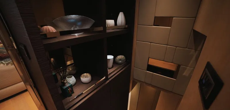  Yacht Photos Pics Luxurious interior of 2013 Sanlorenzo SL94 yacht with elegant decor and shelving.