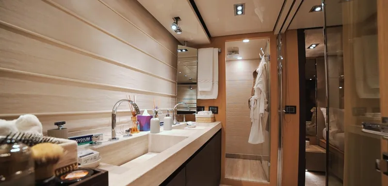  Yacht Photos Pics Luxurious bathroom interior of 2013 Sanlorenzo SL94 yacht with modern fixtures and elegant design.