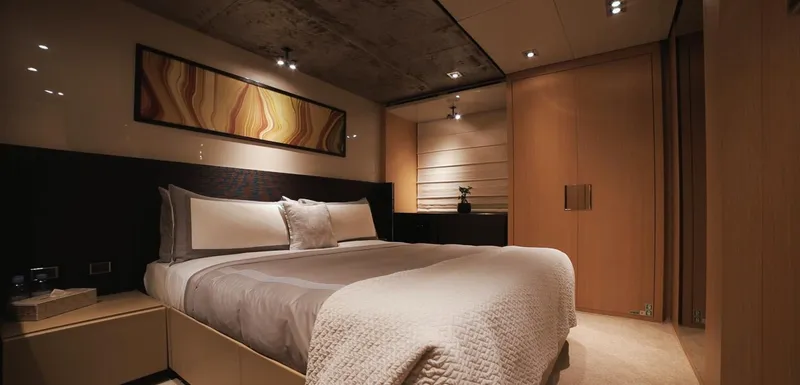  Yacht Photos Pics Luxurious bedroom interior of 2013 Sanlorenzo SL94 yacht with modern decor and ambient lighting.