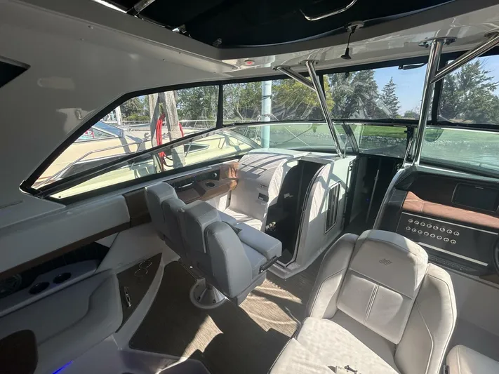  Yacht Photos Pics Interior of 2017 Four Winns H350 boat with modern seating and dashboard.