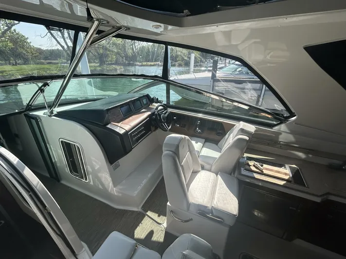  Yacht Photos Pics Interior of 2017 Four Winns H350 boat with modern helm and seating.