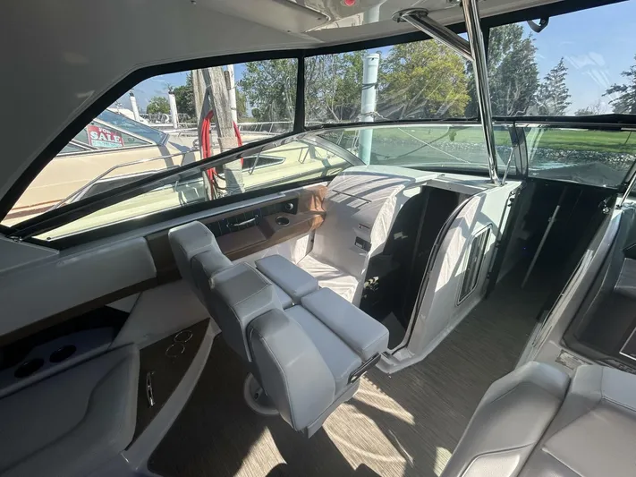  Yacht Photos Pics 2017 Four Winns H350 boat interior with modern helm and seating.