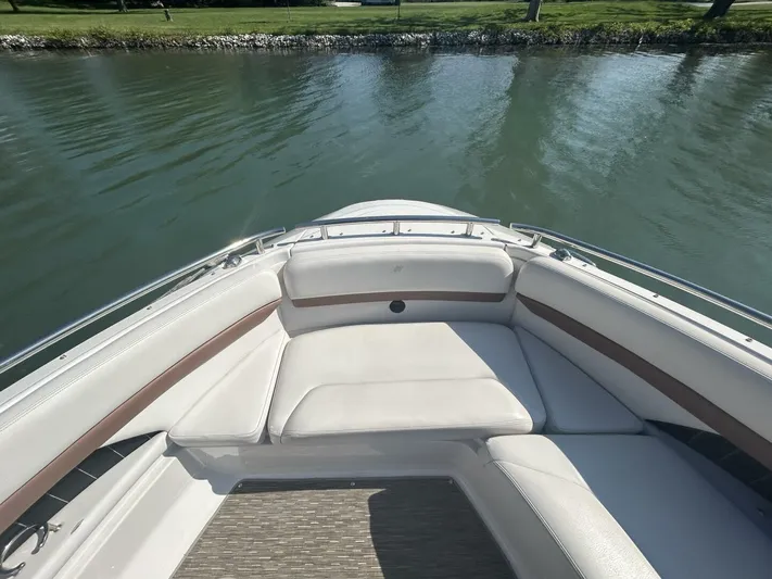  Yacht Photos Pics 2017 Four Winns H350 boat bow with cushioned seating on calm water.