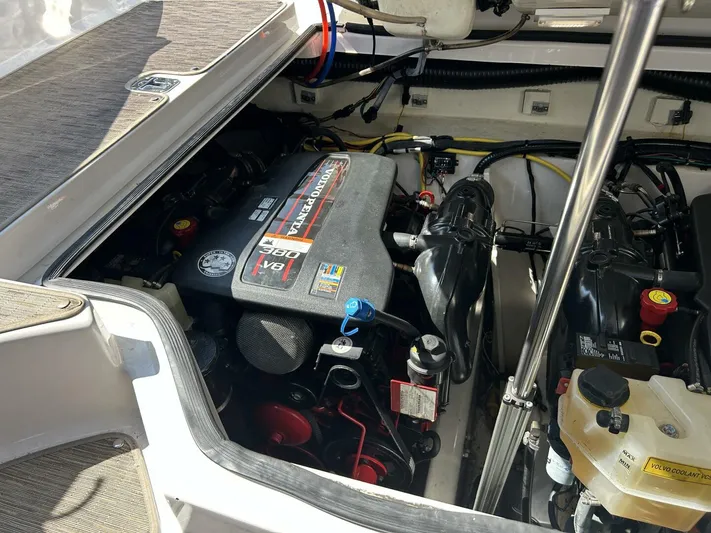  Yacht Photos Pics Engine compartment of a 2017 Four Winns H350 boat, showcasing mechanical components.