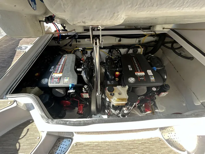  Yacht Photos Pics Engine compartment of a 2017 Four Winns H350 boat, showcasing dual inboard engines.