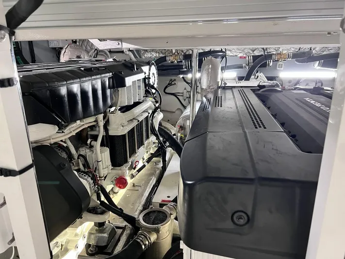  Yacht Photos Pics Engine room of 2022 Cranchi Settantotto 78 yacht, showcasing powerful machinery and components.