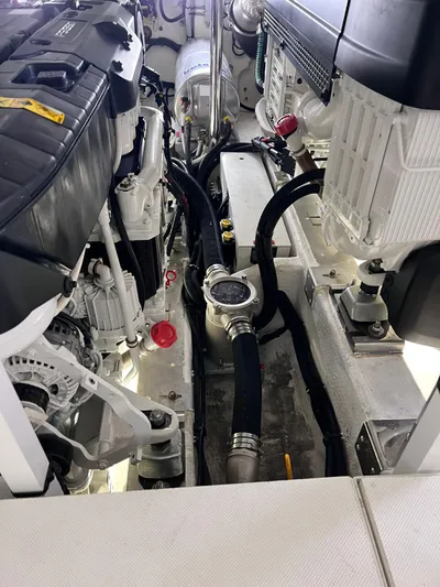  Yacht Photos Pics Engine room of 2022 Cranchi Settantotto 78 yacht, showcasing mechanical components and systems.