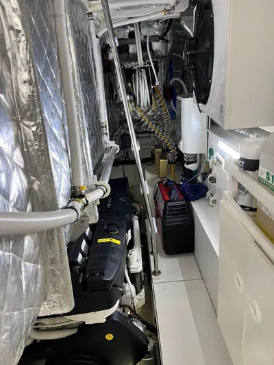  Yacht Photos Pics Engine room of 2022 Cranchi Settantotto 78 yacht, featuring complex machinery and equipment.