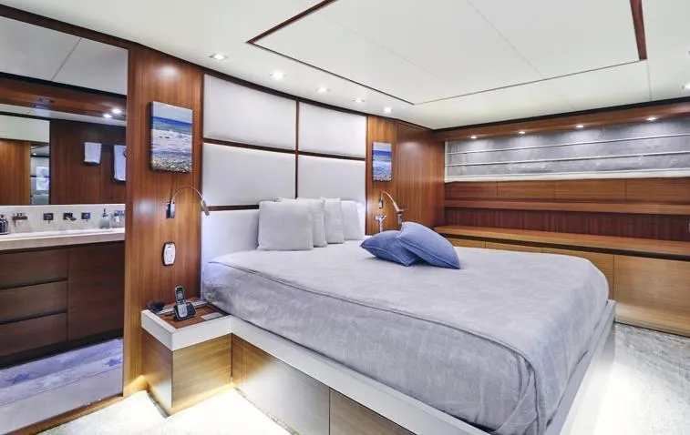  Yacht Photos Pics Luxurious bedroom interior of 2009 Sanlorenzo SL88 yacht with modern design and elegant wood finishes.