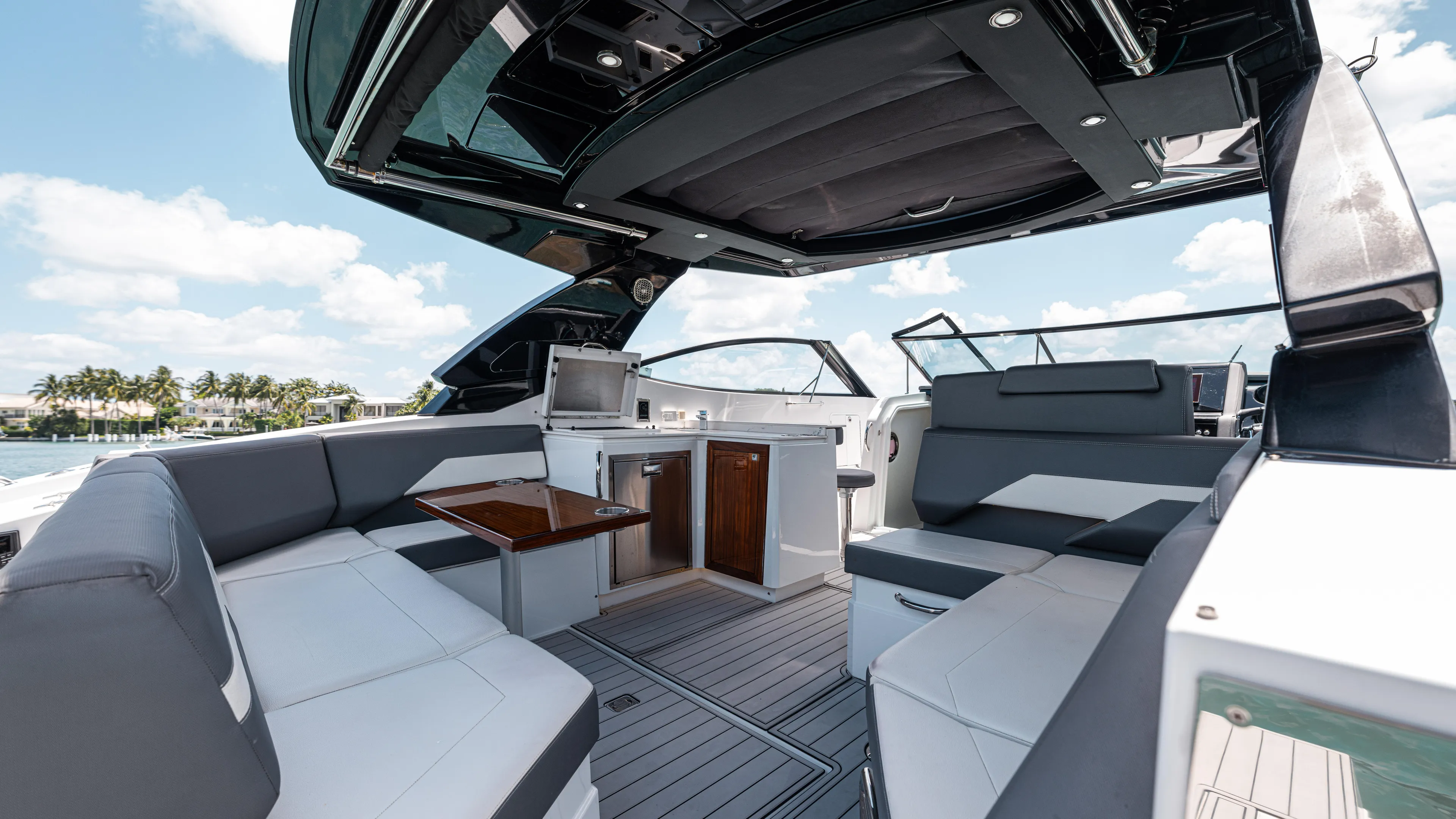  Yacht Photos Pics 2020 Cruisers Yachts 38 GLS OB interior with luxurious seating and modern amenities.