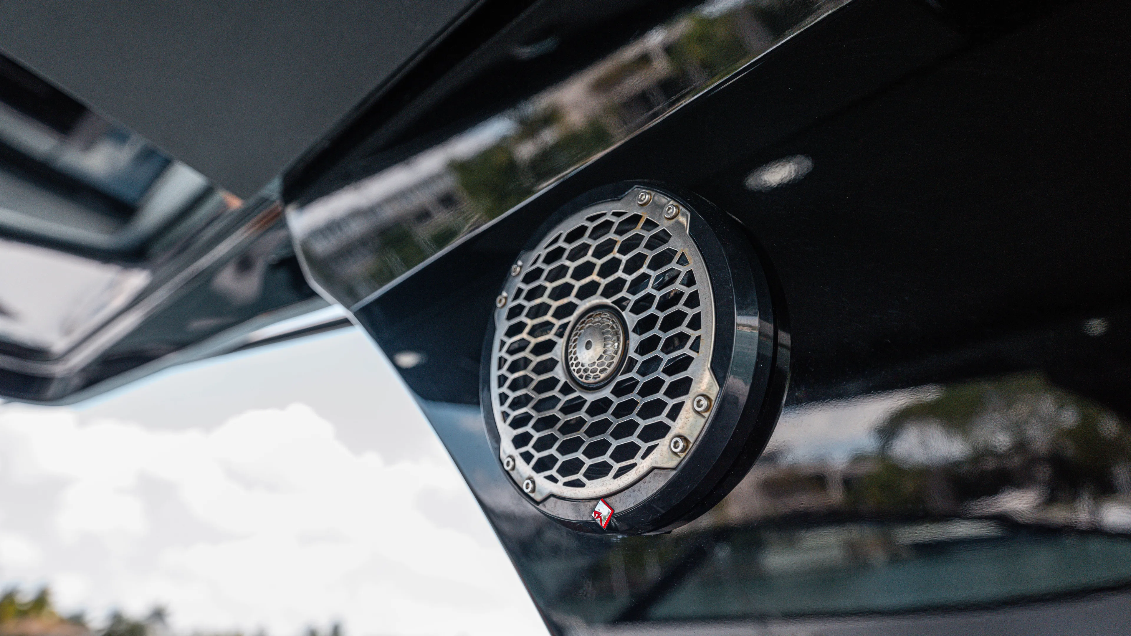  Yacht Photos Pics Outdoor speaker on 2020 Cruisers Yachts 38 GLS OB, showcasing sleek design and audio features.