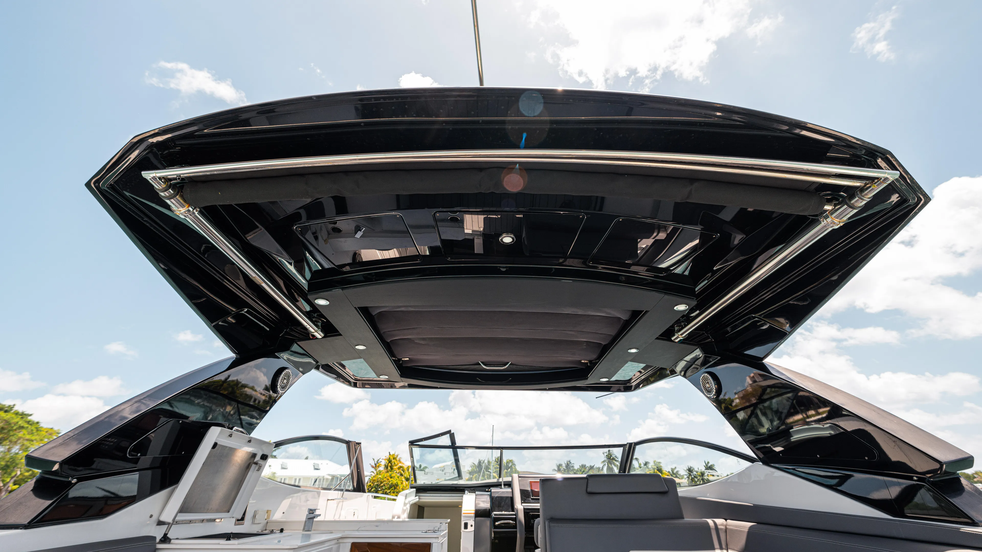  Yacht Photos Pics 2020 Cruisers Yachts 38 GLS OB boat interior with open sunroof, showcasing sleek design.