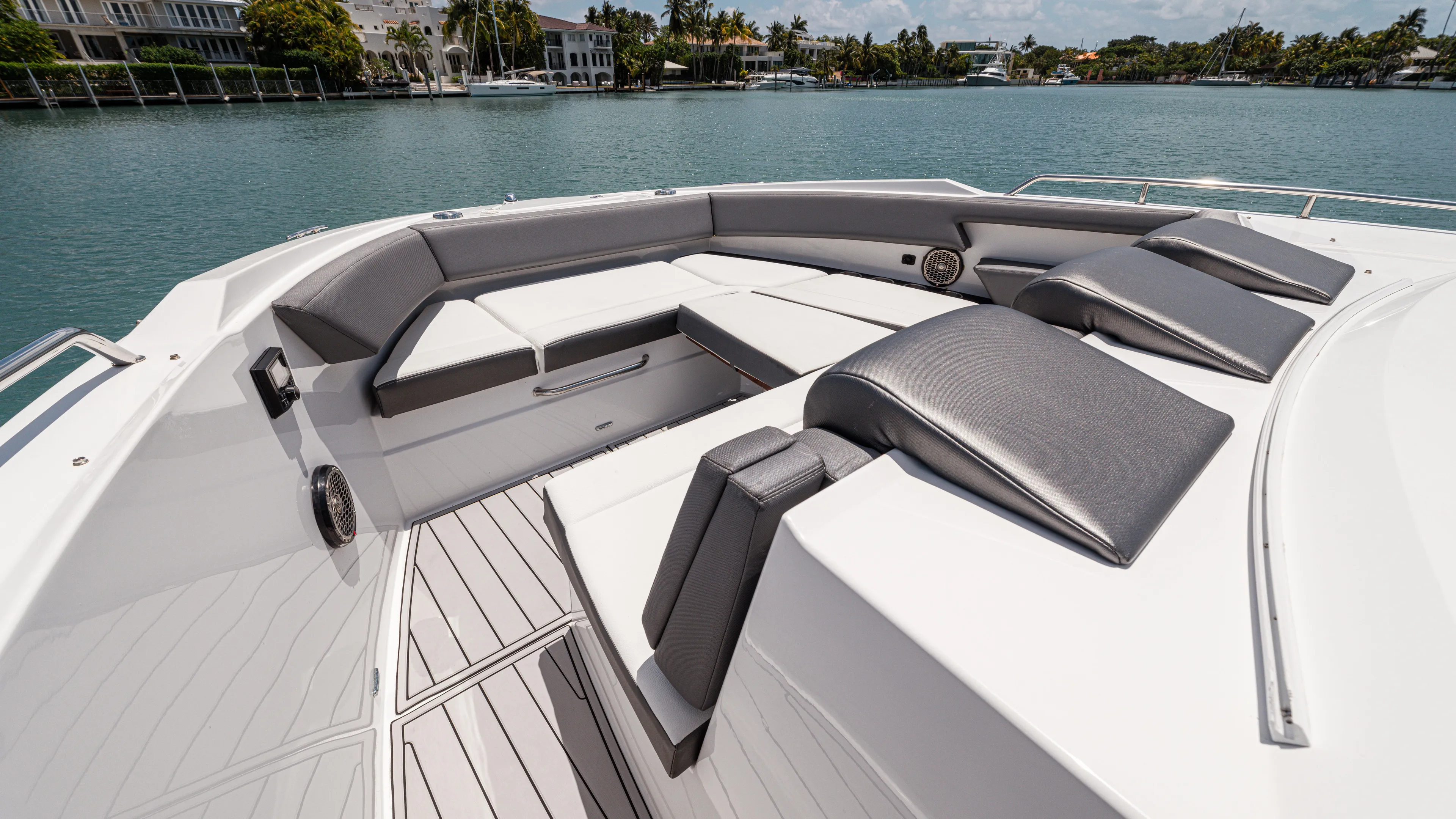 Yacht Photos Pics Luxurious seating area on 2020 Cruisers Yachts 38 GLS OB, overlooking serene waterfront.
