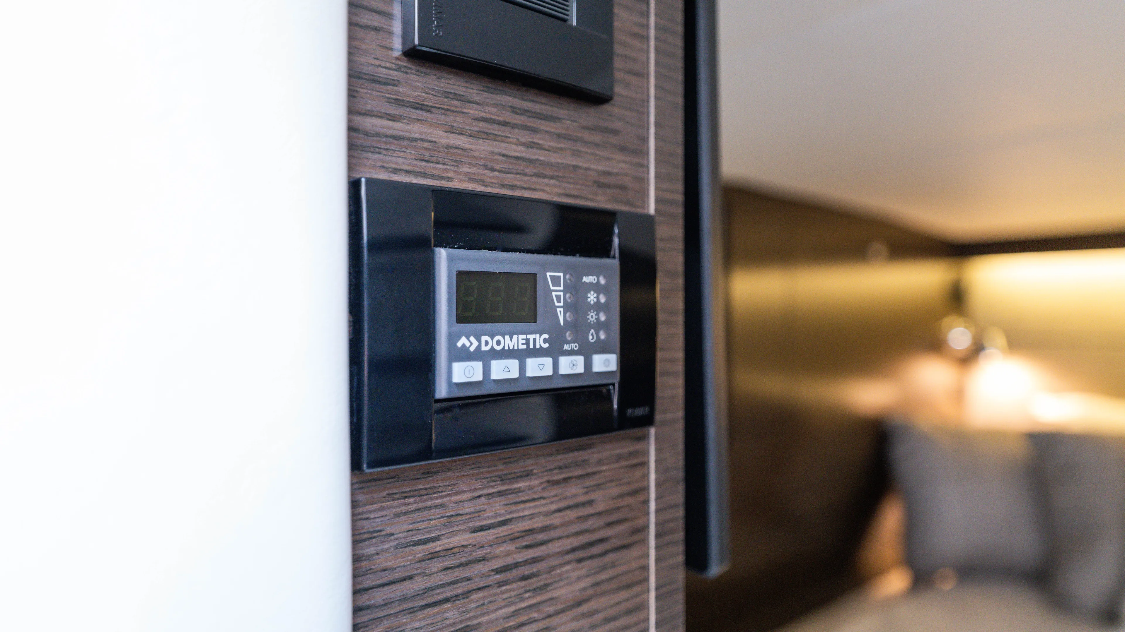  Yacht Photos Pics Dometic control panel on 2020 Cruisers Yachts 38 GLS OB interior wall.