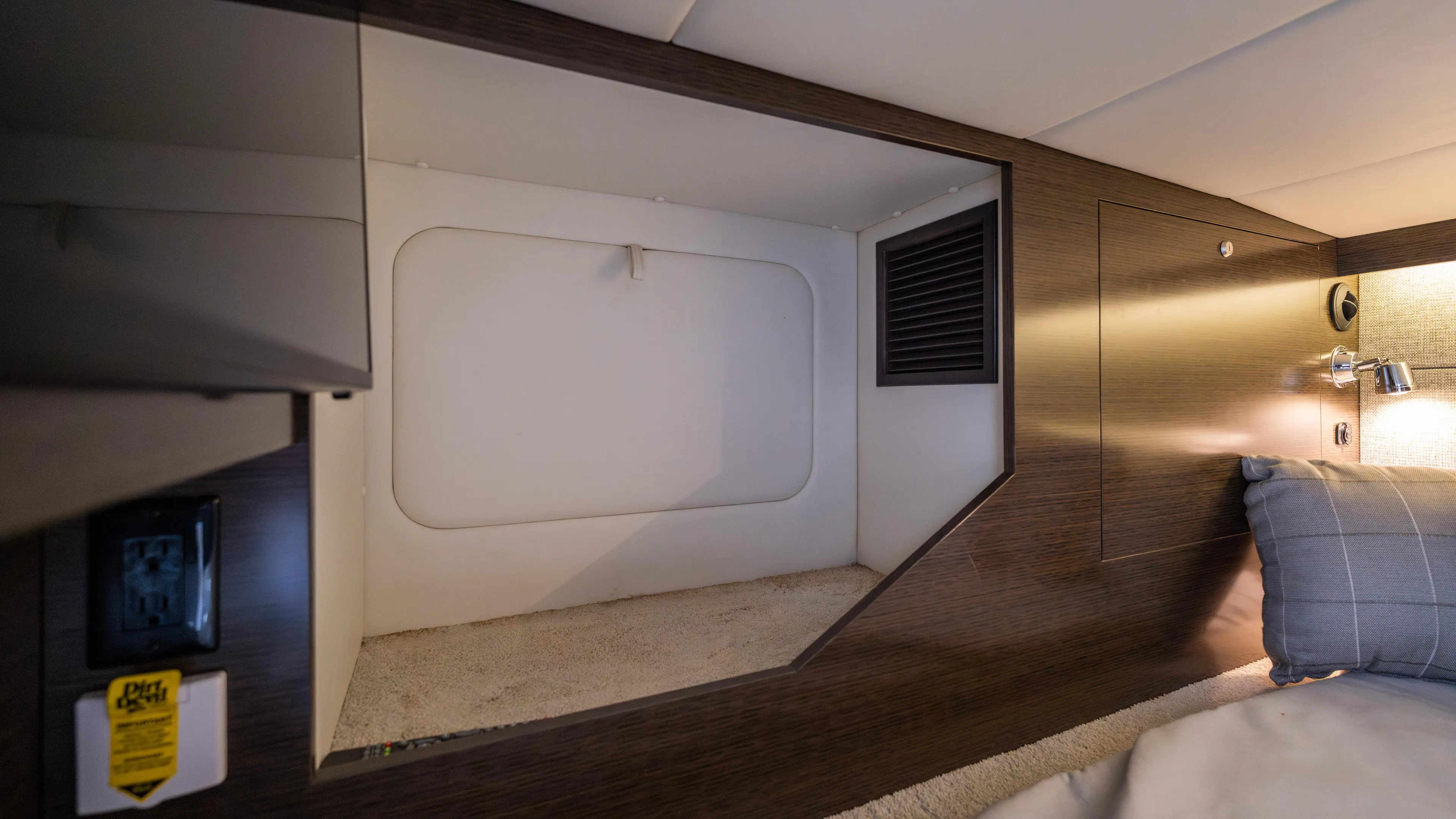  Yacht Photos Pics Interior cabin of 2020 Cruisers Yachts 38 GLS OB, featuring modern design and cozy bedding.