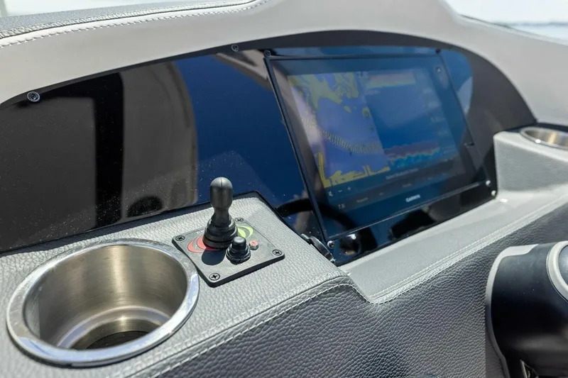  Yacht Photos Pics Dashboard of 2022 Regal 33 OBX boat with navigation screen and controls.