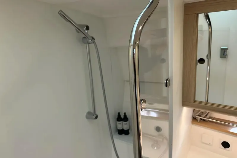 Bertie Yacht Photos Pics Modern bathroom interior of 2024 Nimbus 405 Coupé yacht with sleek shower design.