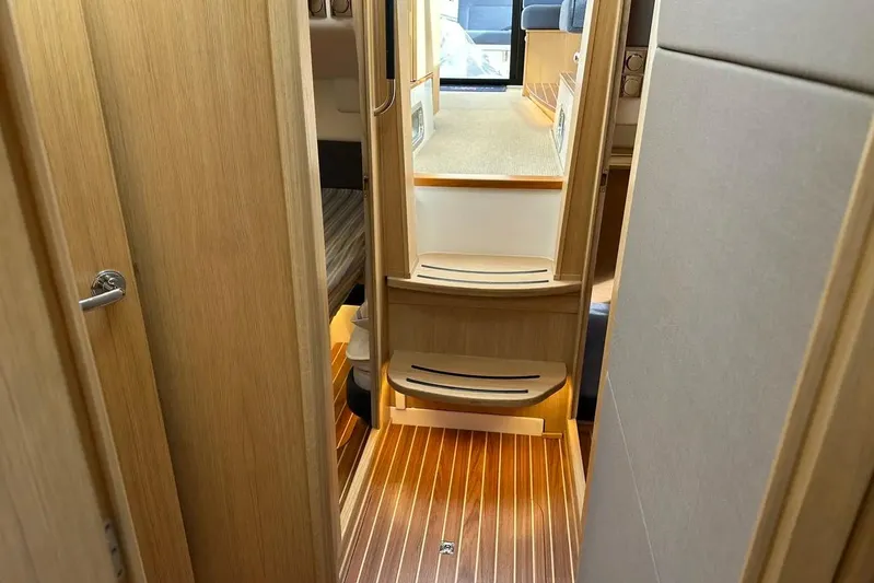 Bertie Yacht Photos Pics Interior of 2024 Nimbus 405 Coupé, featuring wooden flooring and modern design.