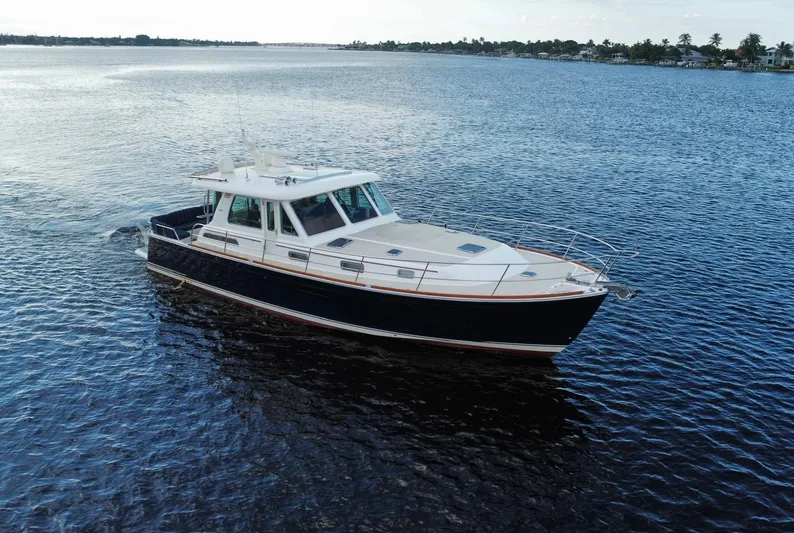  Yacht Photos Pics 2013 Sabre 48 Salon Express yacht cruising on open water.