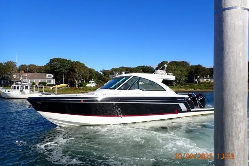  Yacht Photos Pics 2022 Formula 380 Super Sport Crossover OB cruising on a sunny day.