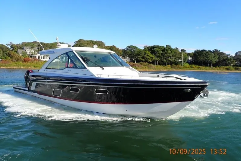  Yacht Photos Pics 2022 Formula 380 Super Sport Crossover OB cruising on a sunny day.