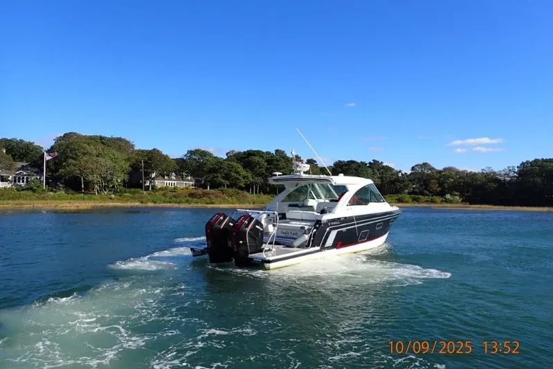  Yacht Photos Pics 2022 Formula 380 Super Sport Crossover OB cruising on a sunny day.