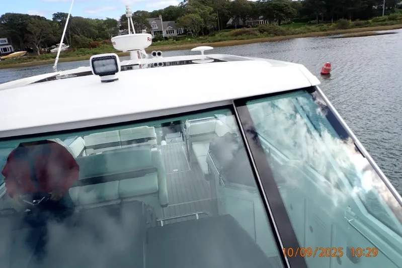  Yacht Photos Pics 2022 Formula 380 Super Sport Crossover OB on water, showcasing sleek design and spacious interior.