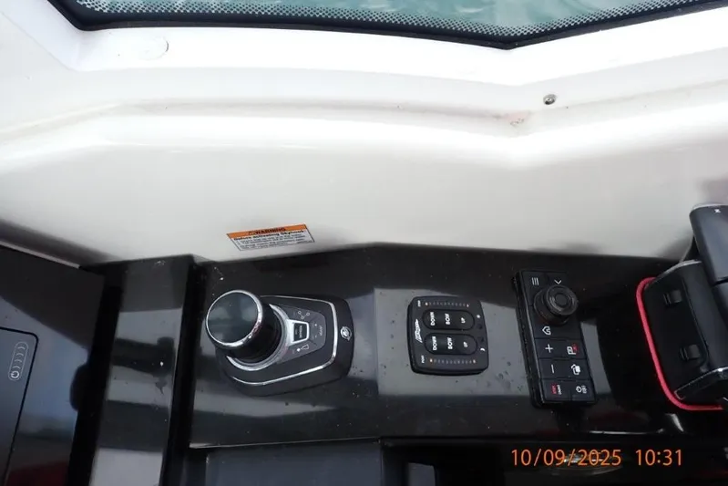  Yacht Photos Pics Control panel of 2022 Formula 380 Super Sport Crossover OB boat cockpit.