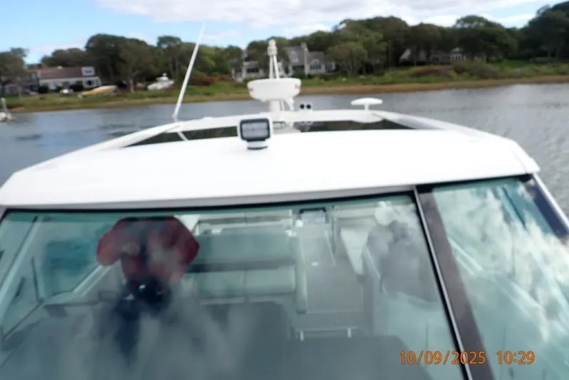  Yacht Photos Pics 2022 Formula 380 Super Sport Crossover OB on a scenic waterway.