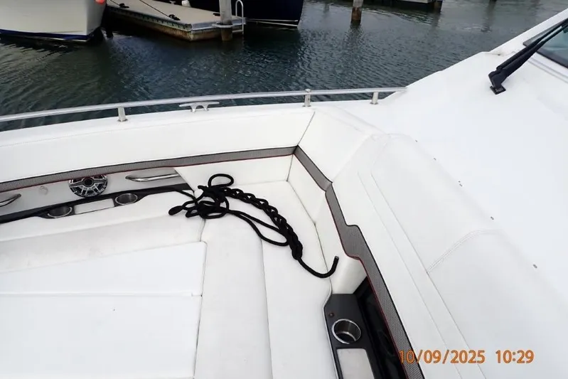  Yacht Photos Pics 2022 Formula 380 Super Sport Crossover OB boat interior with seating and docked at marina.